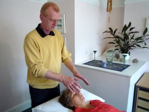 Gerry giving Reiki